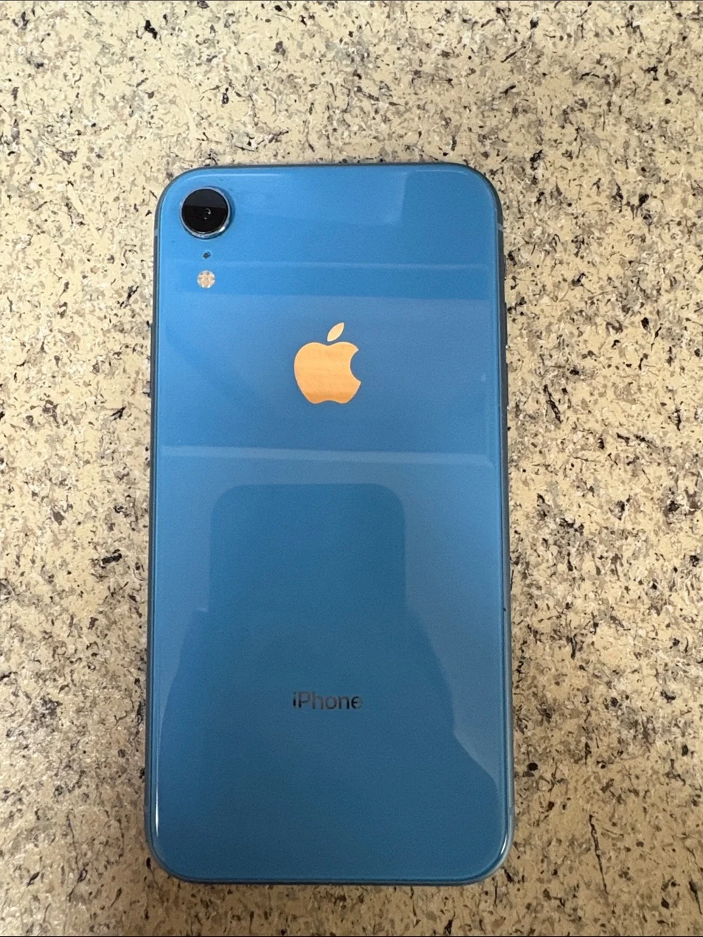 Apple iPhone in Black with Blue-Purple Display
